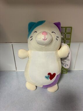 Squishmallow - Cora Hug Mees, Plush Cat Stuffed Animal 9”